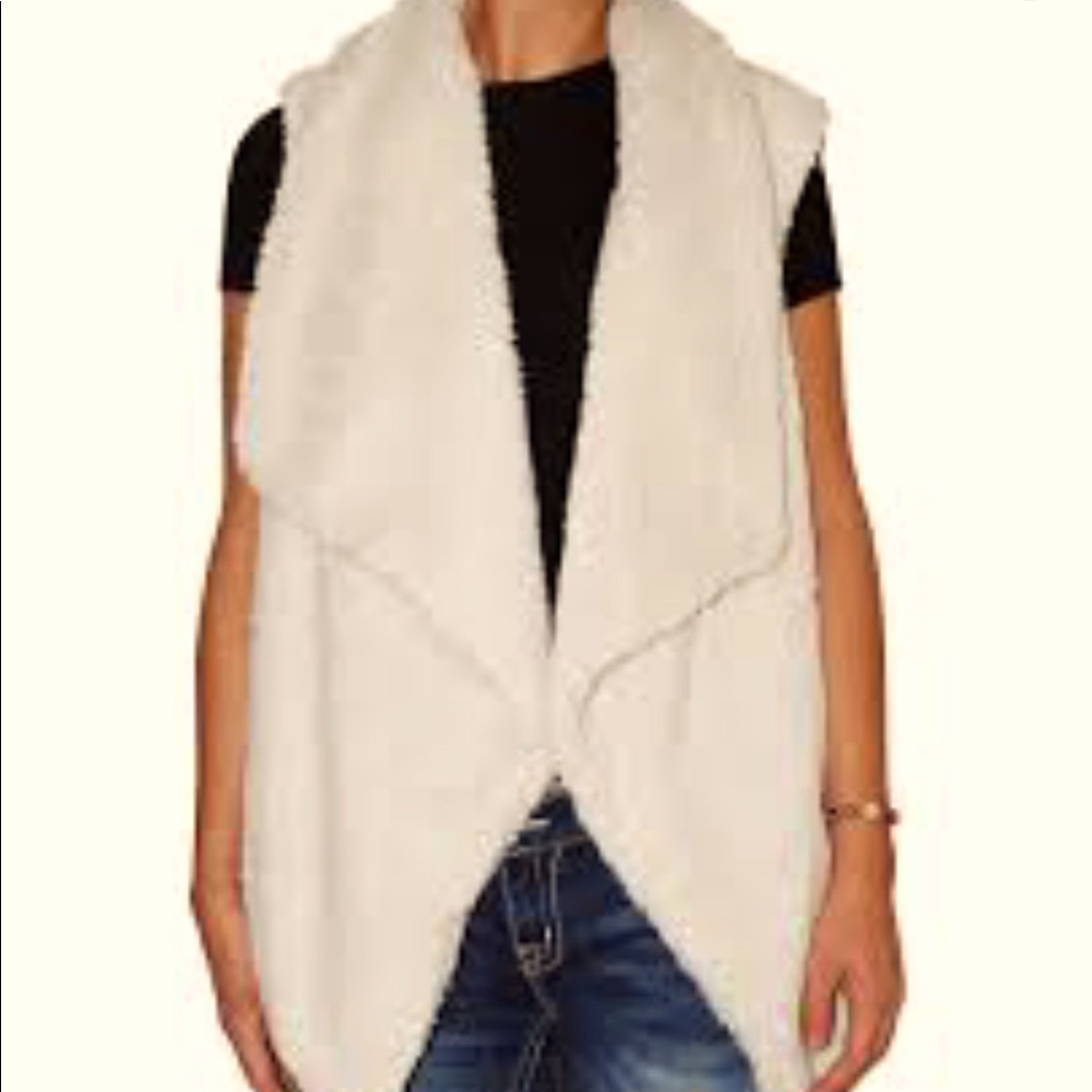 COPY - Fuzzy faux-sherpa vest. This one's got a drapey open front and ribbed kn…